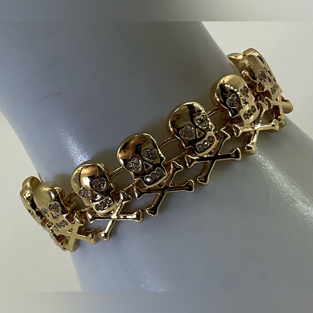 BAUBLEBAR GOLD TONE SKULL AND CROSS BONES LINK BRACELET CRYSTAL RHINESTONE EYES